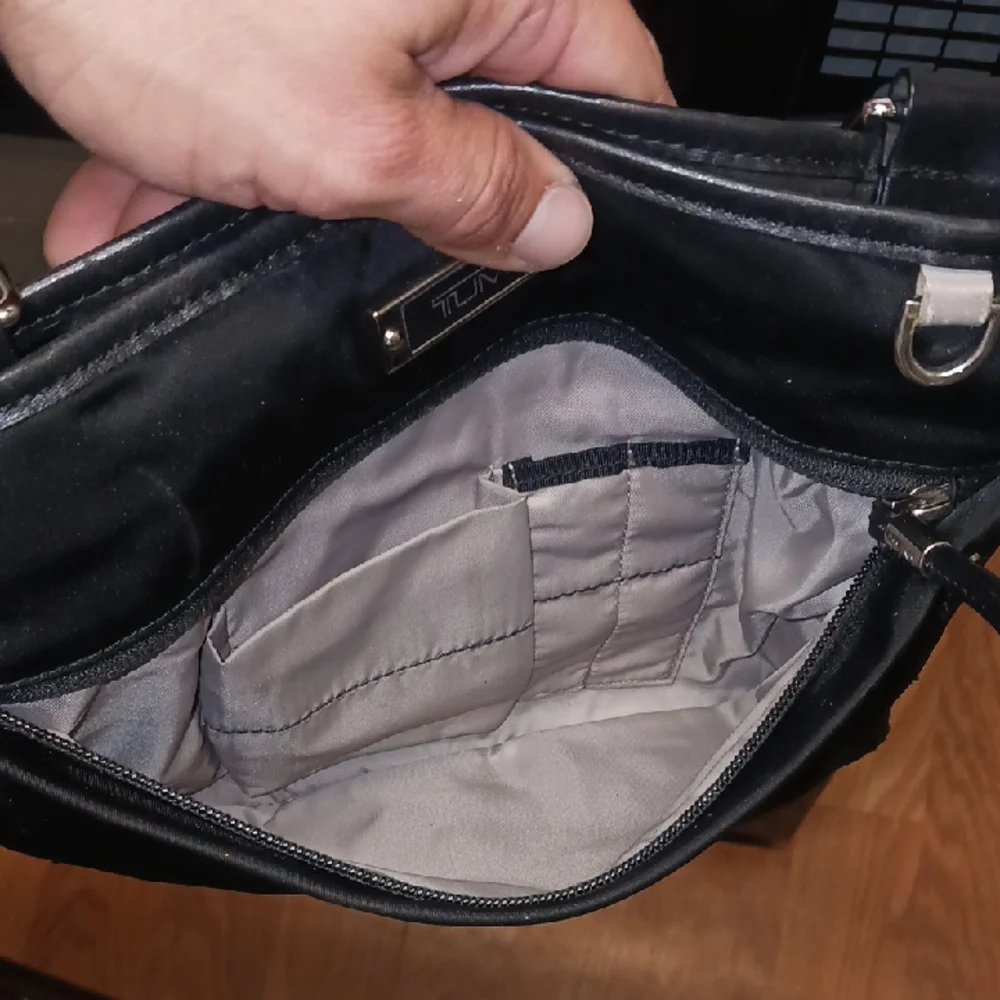 Tumi Black Messenger Bag with Adjustable Strap